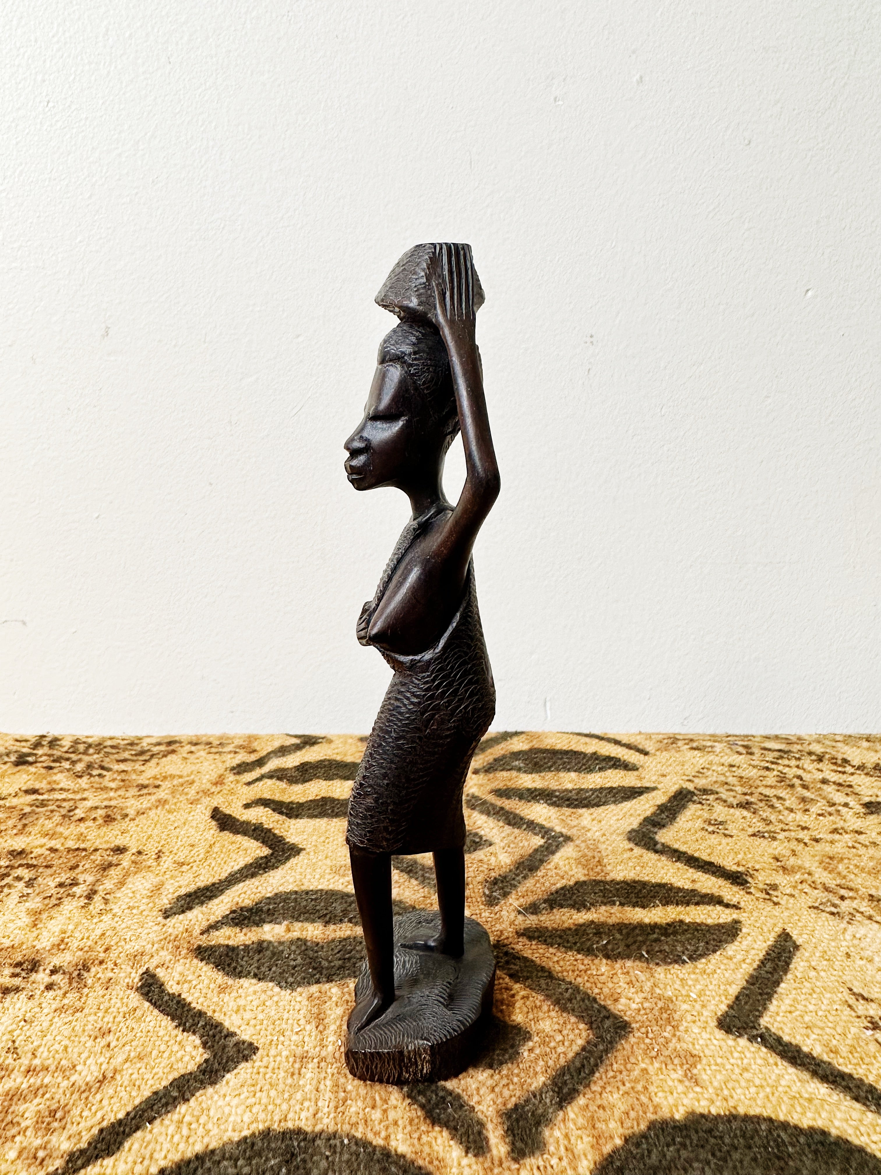 Small African Woman Carrying Basket Statue